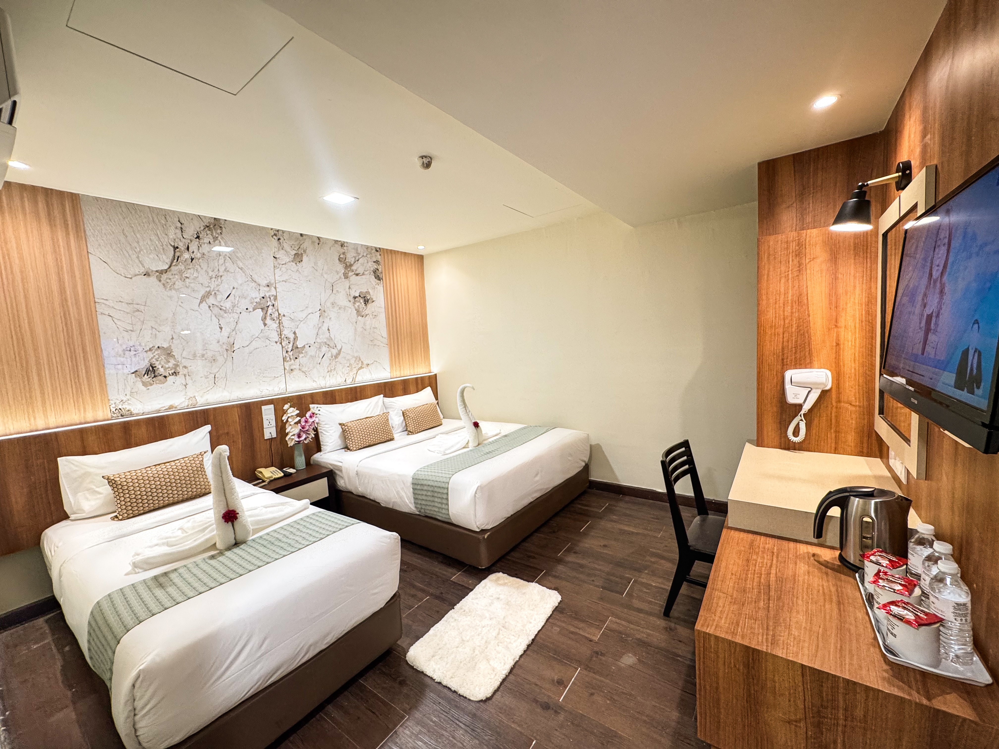 Deluxe Triple Room at Swiss Hotel Kuala Lumpur